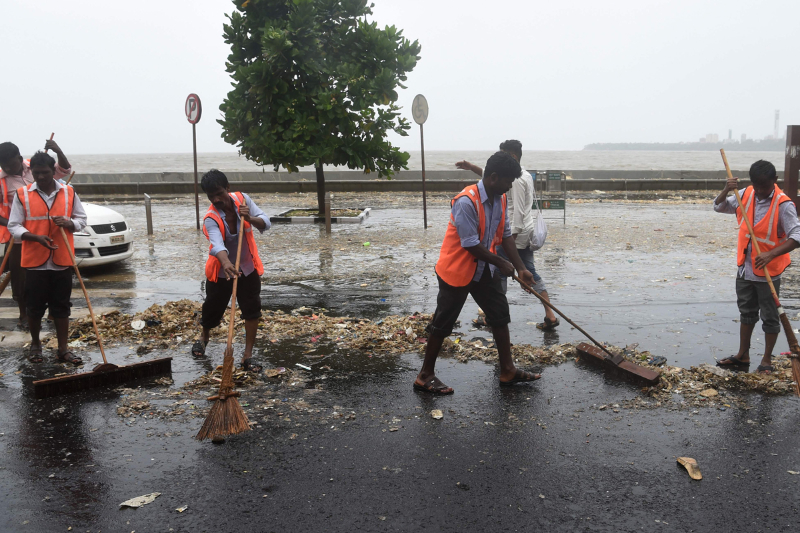 BMC workers clearing the garbage