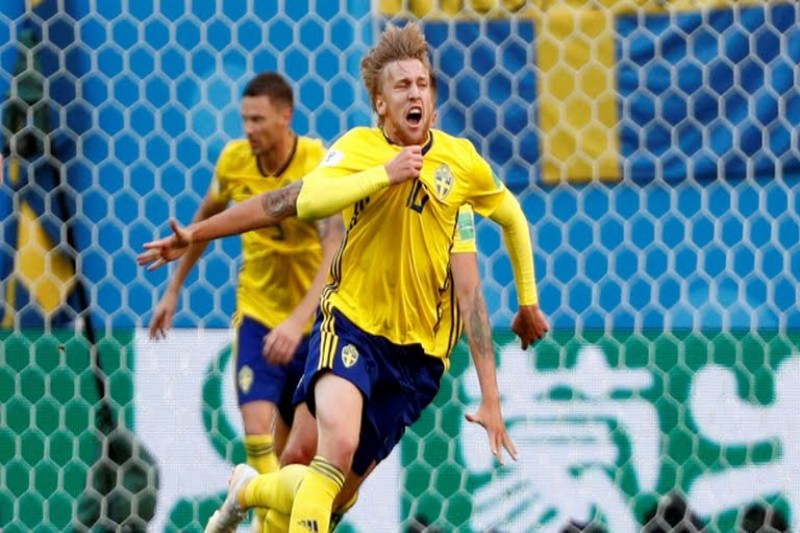Emil Forsberg celebrates after scoring for Sweden against Switzerland