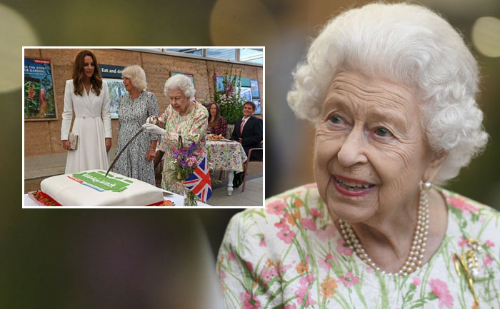 queen elizabeth cut cake with sword