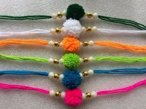 wollen rakhi, dyi wollen rakhi, How to make raakhi at home with wool, 